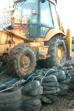 JCB driving over URRO blocks